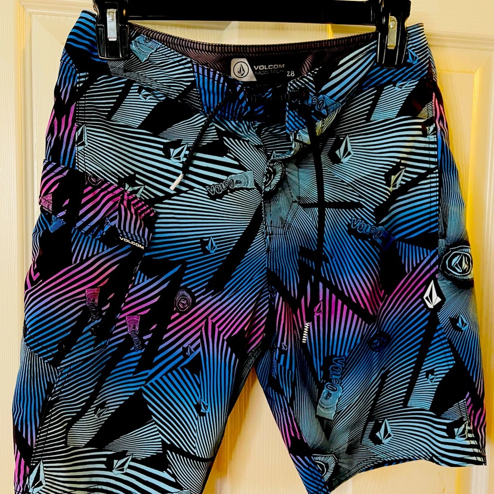 Boys size 14 swim trunks. Colorful. From brand Volcom
